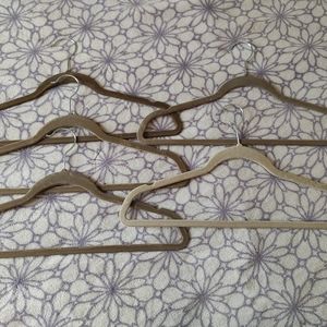 5 Greenish velvet hangers